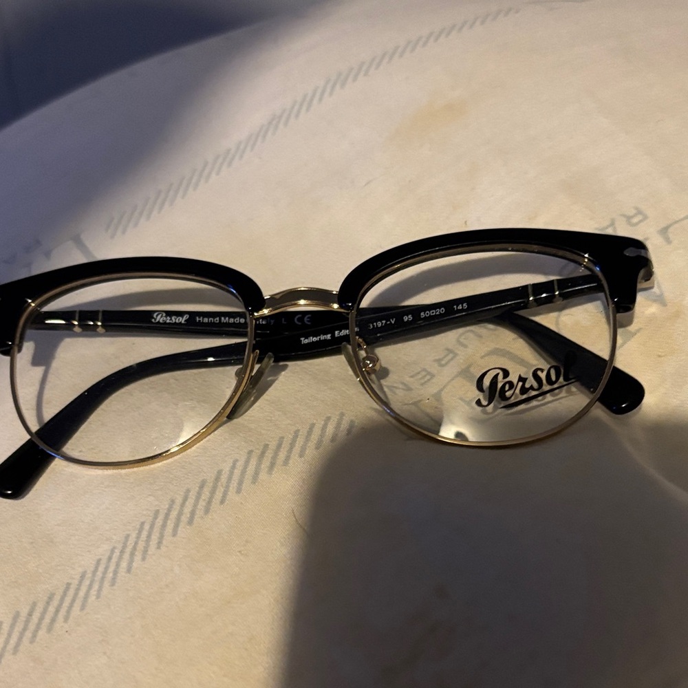 Persol Black and Gold Frame Glasses